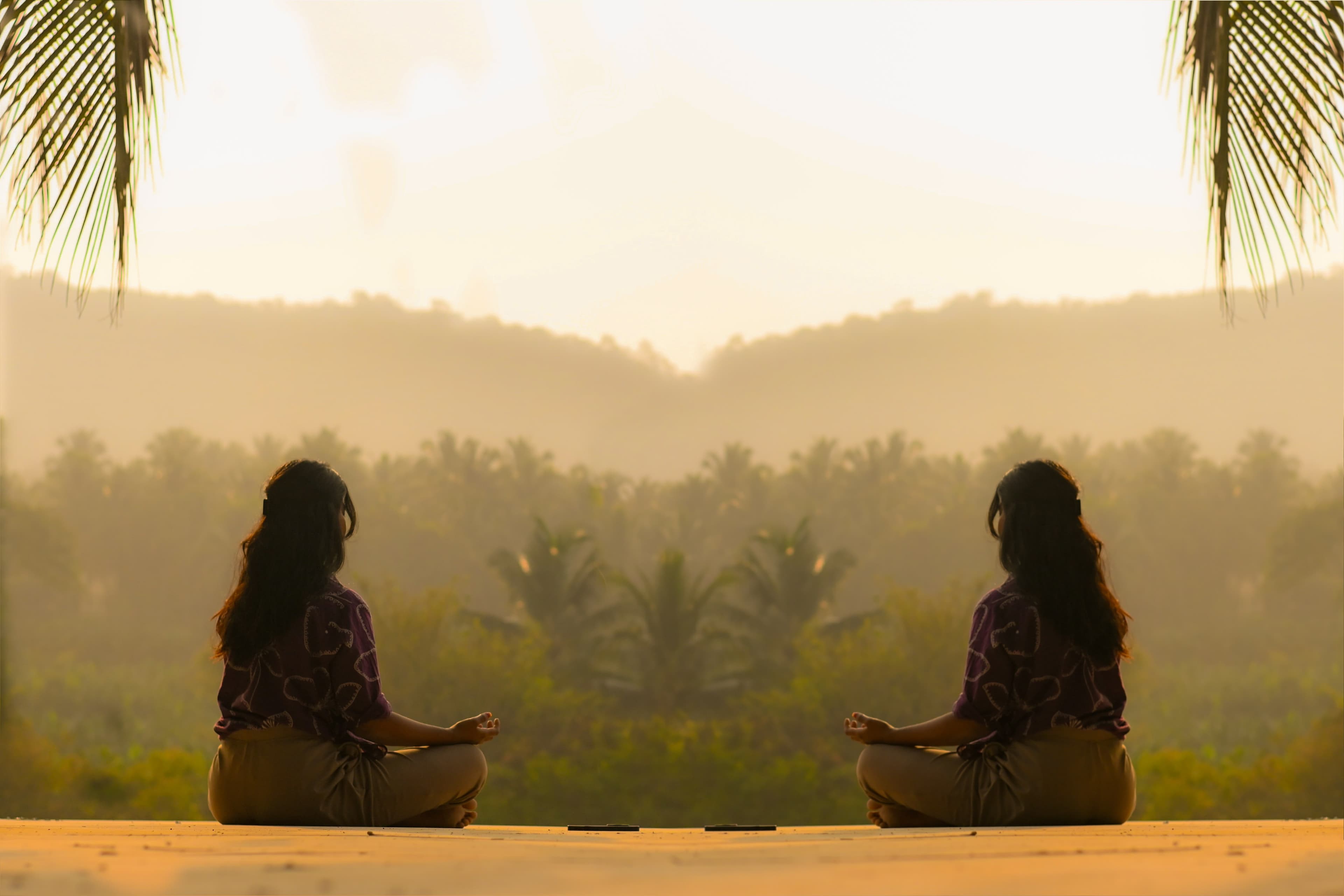 Ashwitha in a handstand · corporate wellness day